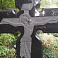 Памятник с рельефным крестом на Смоленском кладбище Санкт-Петербурга